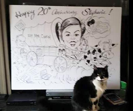Pet Portrait Caricature of Patrick's cat on his desk at homein Atlanta